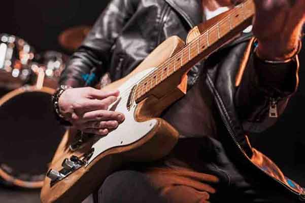 Man Playing Electric Guitar