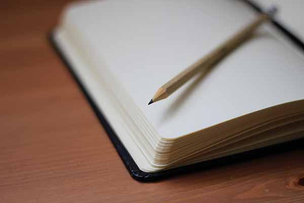 song-structure A Pencil on Top of an Open Notebook
