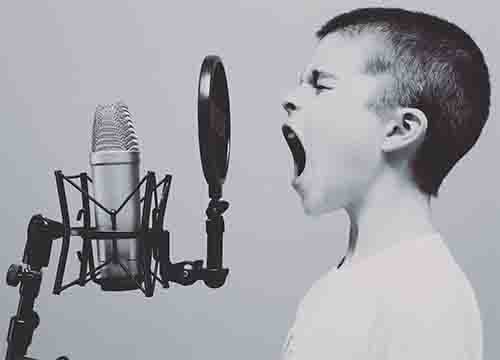 Child Screaming Into Studio Microphone
